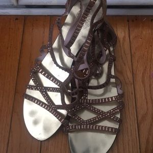 Tan and gold sandals